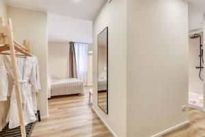 Voodi või voodid majutusasutuse Welchome - Suites toas