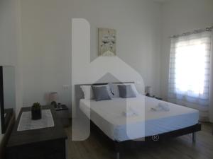 Postel nebo postele na pokoji v ubytování Homiday - Residenza Tulipani