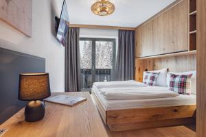 Ένα ή περισσότερα κρεβάτια σε δωμάτιο στο Hotel Bad Neunbrunnen am Waldsee - non Halal