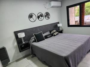 Hotel El Paraiso Boutique客房内的一张或多张床位