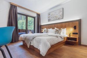 Postel nebo postele na pokoji v ubytování Hotel Bad Neunbrunnen am Waldsee - non Halal + 37 fotografií