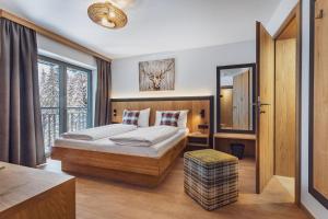 Ένα ή περισσότερα κρεβάτια σε δωμάτιο στο Hotel Bad Neunbrunnen am Waldsee - non Halal