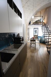 Kuchyň nebo kuchyňský kout v ubytování Stelladimare Suites + 27 fotografií