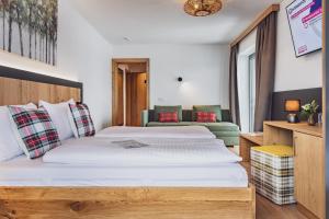 Ένα ή περισσότερα κρεβάτια σε δωμάτιο στο Hotel Bad Neunbrunnen am Waldsee - non Halal