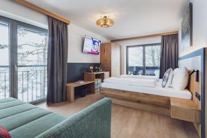 Ένα ή περισσότερα κρεβάτια σε δωμάτιο στο Hotel Bad Neunbrunnen am Waldsee - non Halal