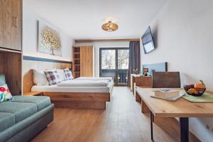 Ένα ή περισσότερα κρεβάτια σε δωμάτιο στο Hotel Bad Neunbrunnen am Waldsee - non Halal