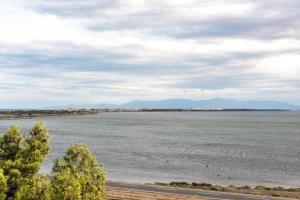 a view of a large body of water at Casa Lacambra - Leucate Plage - 8 People in Leucate +9 photos