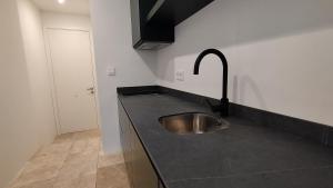 Kuchyňa alebo kuchynka v ubytovaní Hotel Viento10