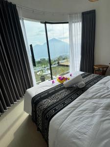 Postel nebo postele na pokoji v ubytování TUGU Bali glamping