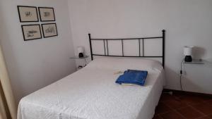 Voodi või voodid majutusasutuse B&B Castiglias toas