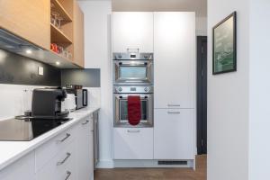 Kuchyň nebo kuchyňský kout v ubytování Xylo Apartments - Kentish Town