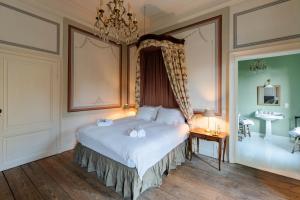 Postel nebo postele na pokoji v ubytování B&B De Corenbloem Luxury Guesthouse - Adults Only