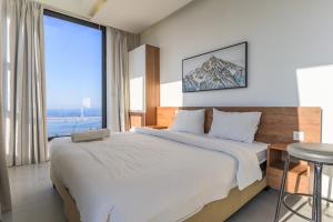 Ein Bett oder Betten in einem Zimmer der Unterkunft Gate 9 Tower - Studios & Apartments in Mar Mikhael