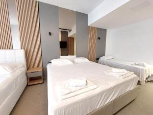 Letto o letti in una camera di Hotel Almanas