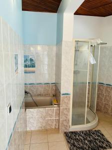 Koupelna v ubytování Maison spacieuse et confortable