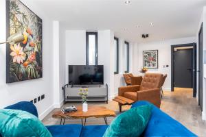 TV a/nebo společenská místnost v ubytování Xylo Apartments - Kentish Town
