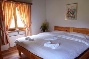Postel nebo postele na pokoji v ubytování Hotel Restaurant Walserhof