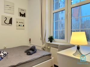 Postel nebo postele na pokoji v ubytování Downtown Room at Old Town Gdansk