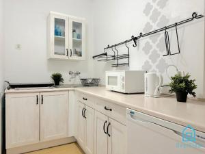 Kuchyň nebo kuchyňský kout v ubytování Downtown Room at Old Town Gdansk