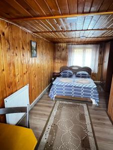Łóżko lub łóżka w pokoju w obiekcie Pid Playem