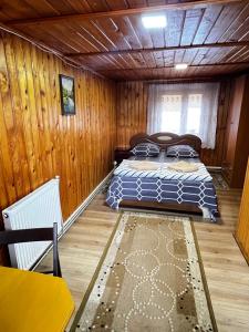 Łóżko lub łóżka w pokoju w obiekcie Pid Playem