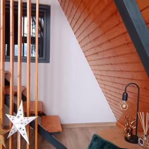 a room with a table and a star on the wall at Cabana Alive - Colibita in Colibiţa +27 photos