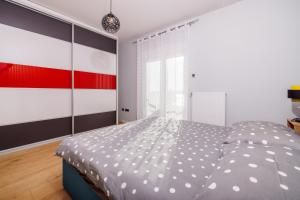 Posteľ alebo postele v izbe v ubytovaní Red Paradise