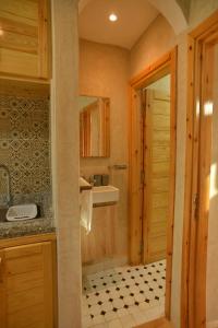 a kitchen with a sink and a counter top at Tirazir House 6 in Mirleft