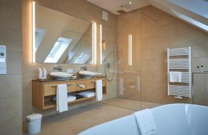 Koupelna v ubytování Hotel Villa Düne