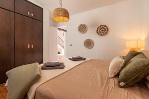 Posteľ alebo postele v izbe v ubytovaní New Renovated Central Apartment With Modern Touch