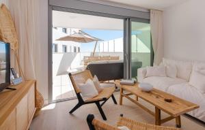a living room with a couch and a table at Luxury New Boho Style Apartment In Mijas Pueblo! in Mijas