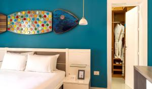 Postel nebo postele na pokoji v ubytování Bakour Punta Cana Suites