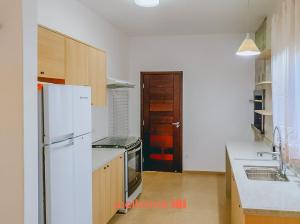 Kuchyň nebo kuchyňský kout v ubytování Casa a 50m da praia no Pontal do Parana