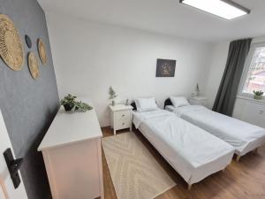 Postel nebo postele na pokoji v ubytování Apartmán U Zámku - Self Check in - Airport OSR Mosnov