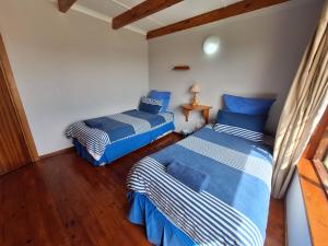 Letto o letti in una camera di PA Sands Beach House Kowie River 9 Sleeper Pool