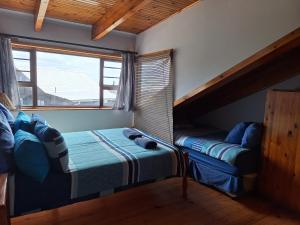 Letto o letti in una camera di PA Sands Beach House Kowie River 9 Sleeper Pool