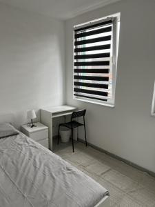 Ένα ή περισσότερα κρεβάτια σε δωμάτιο στο Aparts Room Hannover Centrum