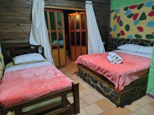 Hotel El Santuario客房内的一张或多张床位