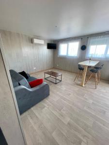 Posezení v ubytování Appartement - location saisonnière