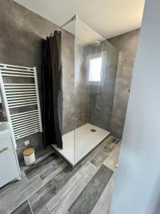 Koupelna v ubytování Appartement - location saisonnière