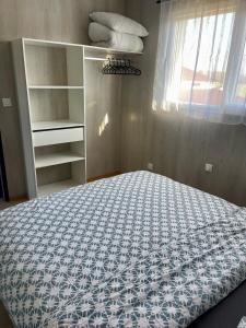 Postel nebo postele na pokoji v ubytování Appartement - location saisonnière