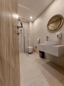 Koupelna v ubytování Hotel Almanas