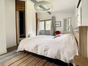 Posteľ alebo postele v izbe v ubytovaní Villa lumineuse à Stella-Plage, jardin clos, terrasse, proche plage et commerces - 6 personnes - FR-1-236-151