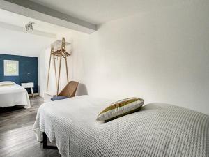 Posteľ alebo postele v izbe v ubytovaní Villa lumineuse à Stella-Plage, jardin clos, terrasse, proche plage et commerces - 6 personnes - FR-1-236-151