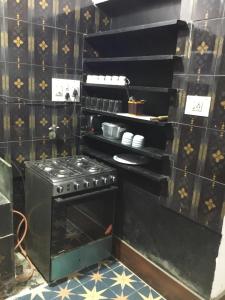 Køkken eller tekøkken på Parimala Residency 2nd Floor Room2