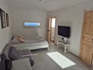 TV a/nebo společenská místnost v ubytování Panoramica Via Villa