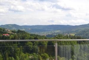 a view of a valley with trees and mountains at Lux Red - Bukowa Góra in Wisła