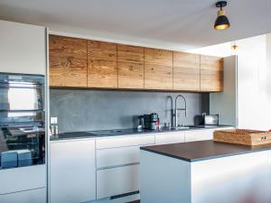 Kuchyň nebo kuchyňský kout v ubytování Apartment Bike & Ski 301 by Interhome