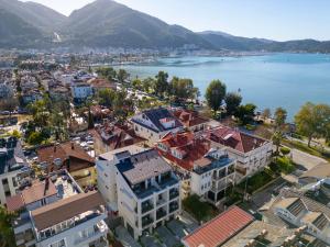 an aerial view of a city and a body of water at Nakas Hotel in Fethiye
