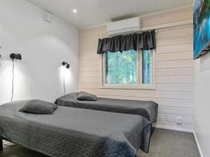 En eller flere senge i et værelse på Holiday Home Himos alppinotko 6 a by Interhome + 15 billeder